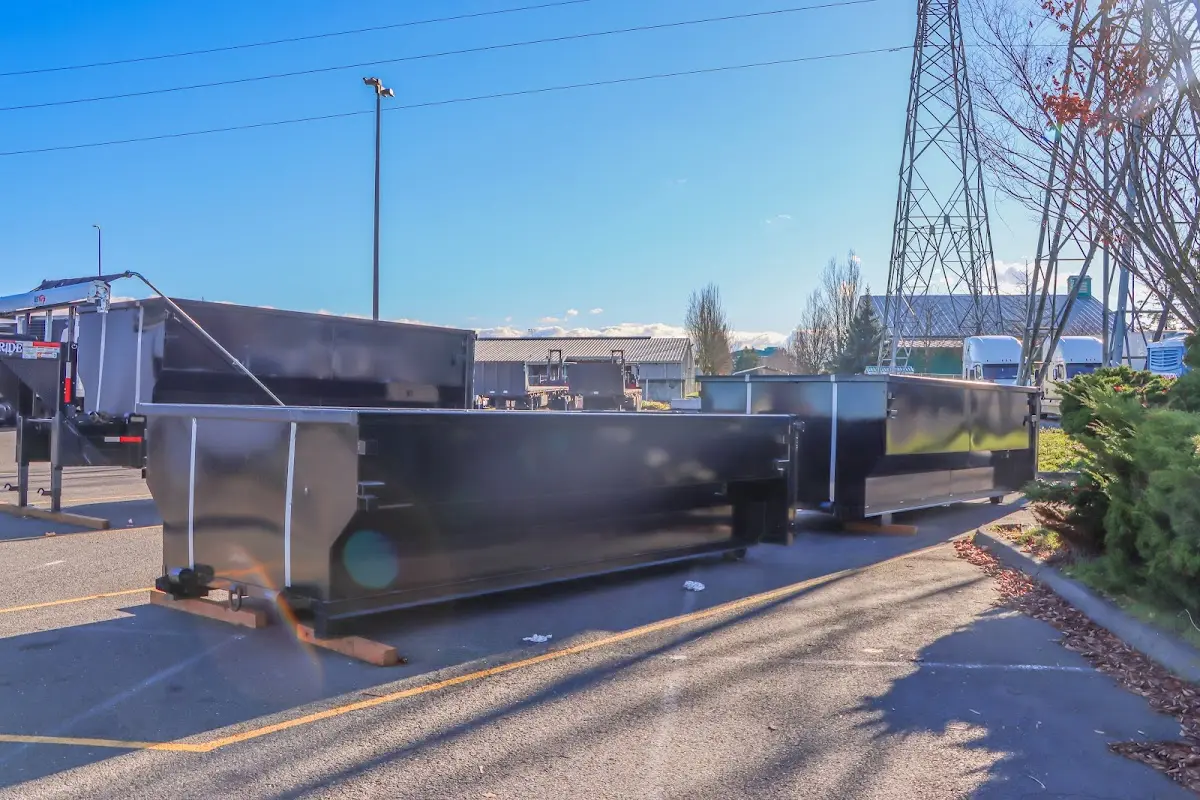 Roll-off dumpster ready for waste disposal at job site for Construction Dumpster Rental in West Monroe